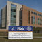 FDA Building 21 stands behind the sign at the campus's main entrance and houses the Center for Drug Evaluation and Research. The FDA campus is located at 10903 New Hampshire Ave., Silver Spring, MD 20993.