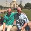 PPMI Participant Hyam Kramer and his husband Tom posing in front of the Taj Mahal on their vacation.