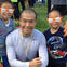 Team Fox athlete and MJFF Patient Council member Jimmy Choi with his two children at a Team Fox event.
