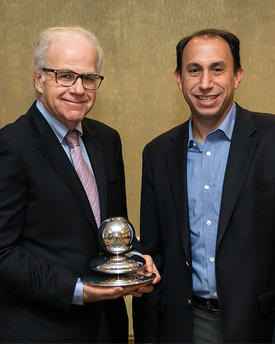Ken Marek accepting the 2017 Robert A. Pritzker Prize for Leadership in Parkinson's Research with Todd Sherer.