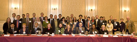 Group photo of individuals at a conference in 2001.
